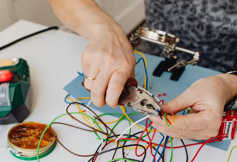 Multi-function wire stripper and cutter combo